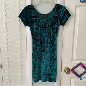 Crushed velvet mini dress with open back